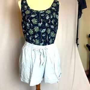 Blue flowered sleeveless blouse